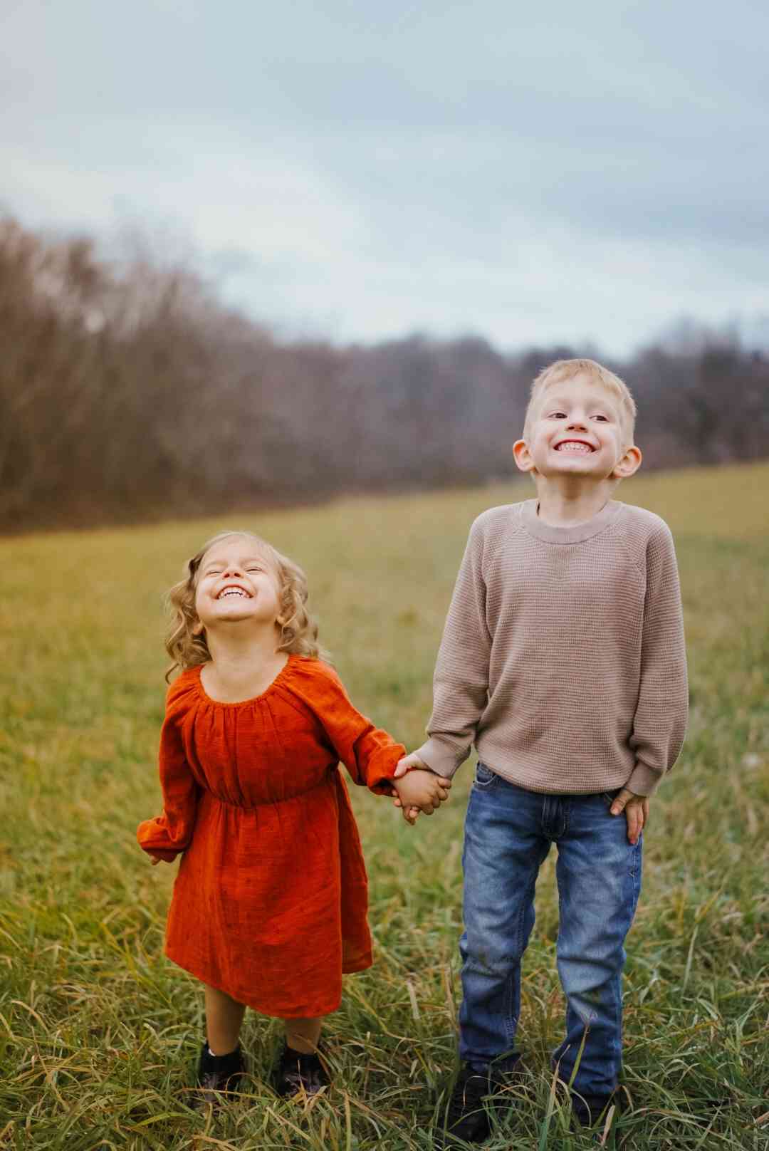 Two children smiling.