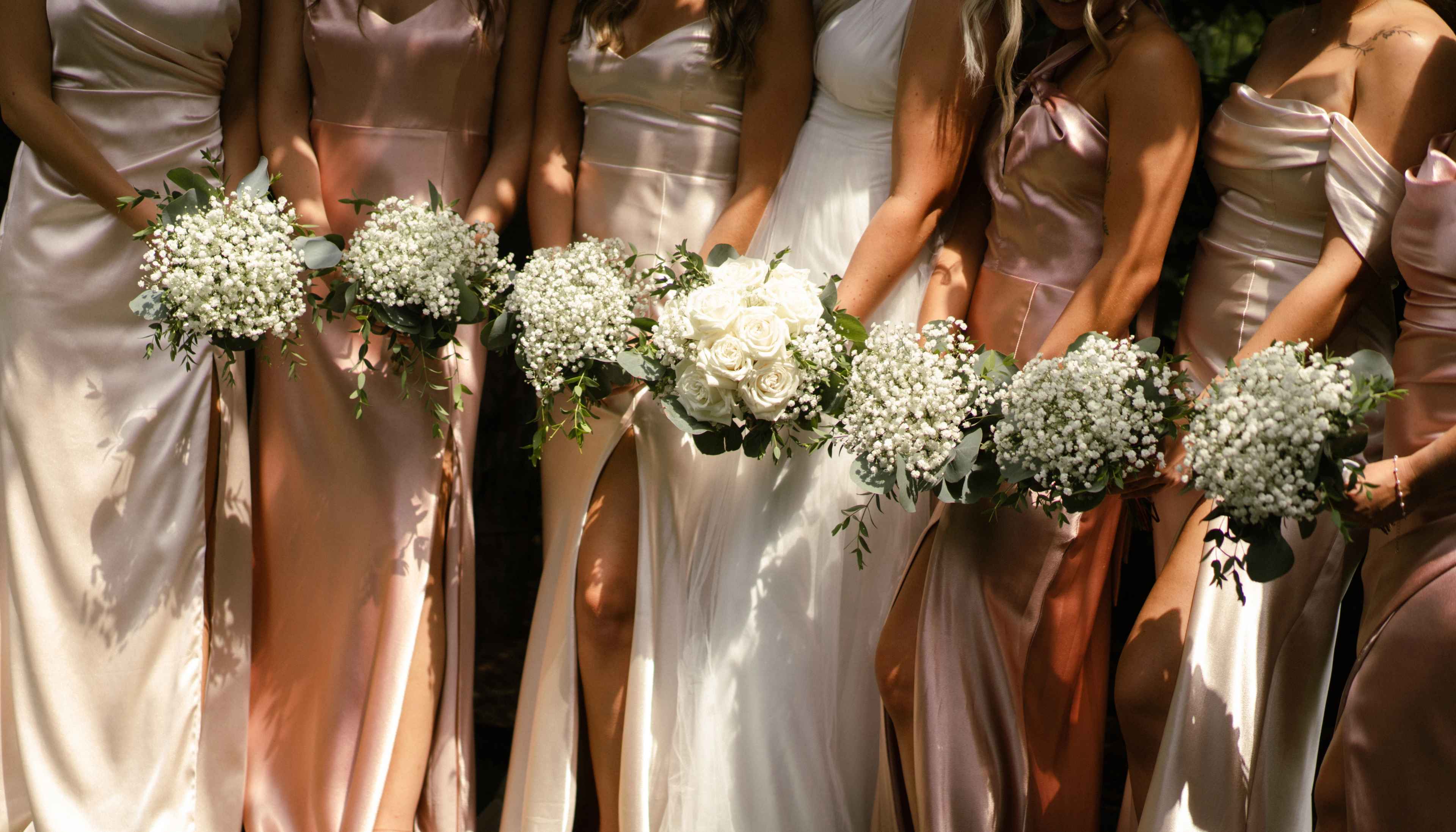 Bridal party with flowers.